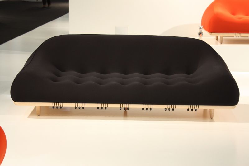 Bernhardt Design presented this sofa called "Mellow." The look is sleek and modern, and it comes in a number of spectacular colors. It uses a medical-grade memory-retention fabric and a special design that incorporates cords beneath underneath. They add a special design detail and help the sofa adjust to those sitting on it.