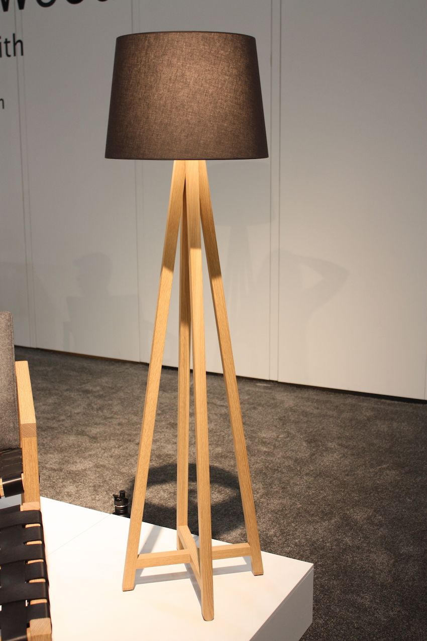 Another elegant wooden floor lamp is from Canada's Christopher Solar Design. Available in white oak or black ash, the The Alpha floor lamp has tall, tapered legs making up its wooden base . The large drum shade tops off the piece, making for a clean and elegant fixture.